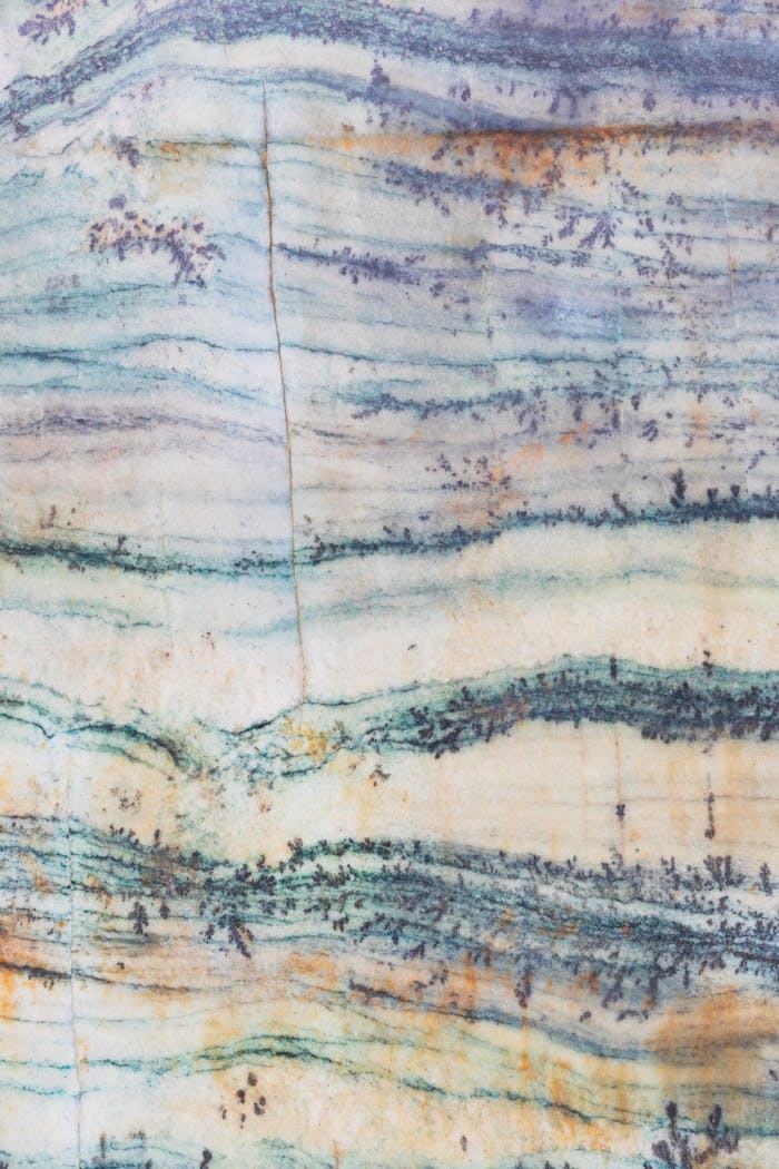 why-choose-us Close-up of a natural stone surface showcasing unique patterns and textures.